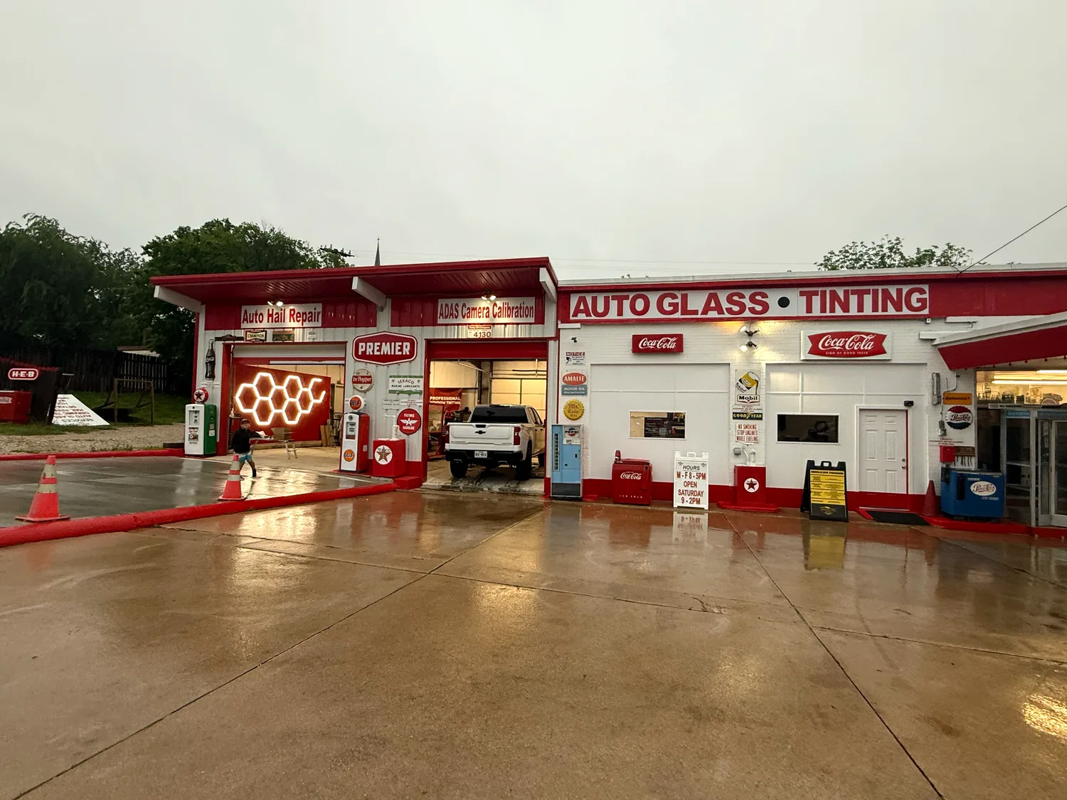 The AGC Auto Glass and Car Care shop, a restored vintage red and white filling station